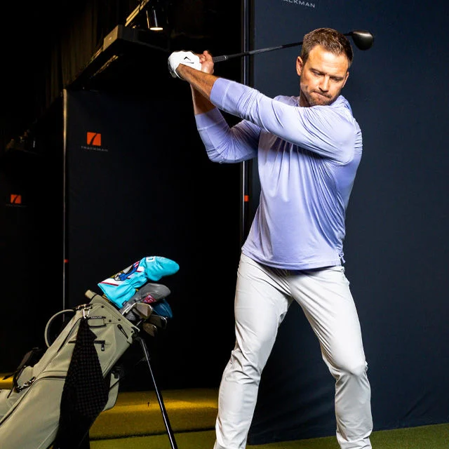 A man using a hitting bay.