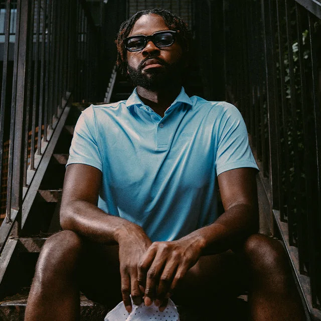 A man wearing swag apparel.